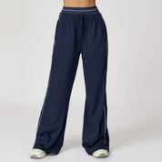 Daisy Harrison | Pantalon de survêtement noir à jambes larges avec bandes latérales