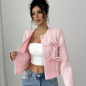 Millicent Scott | Veste courte en tweed rose avec nœud décoratif