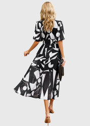 Camilla Rowntree | Robe midi fleurie à manches bouffantes