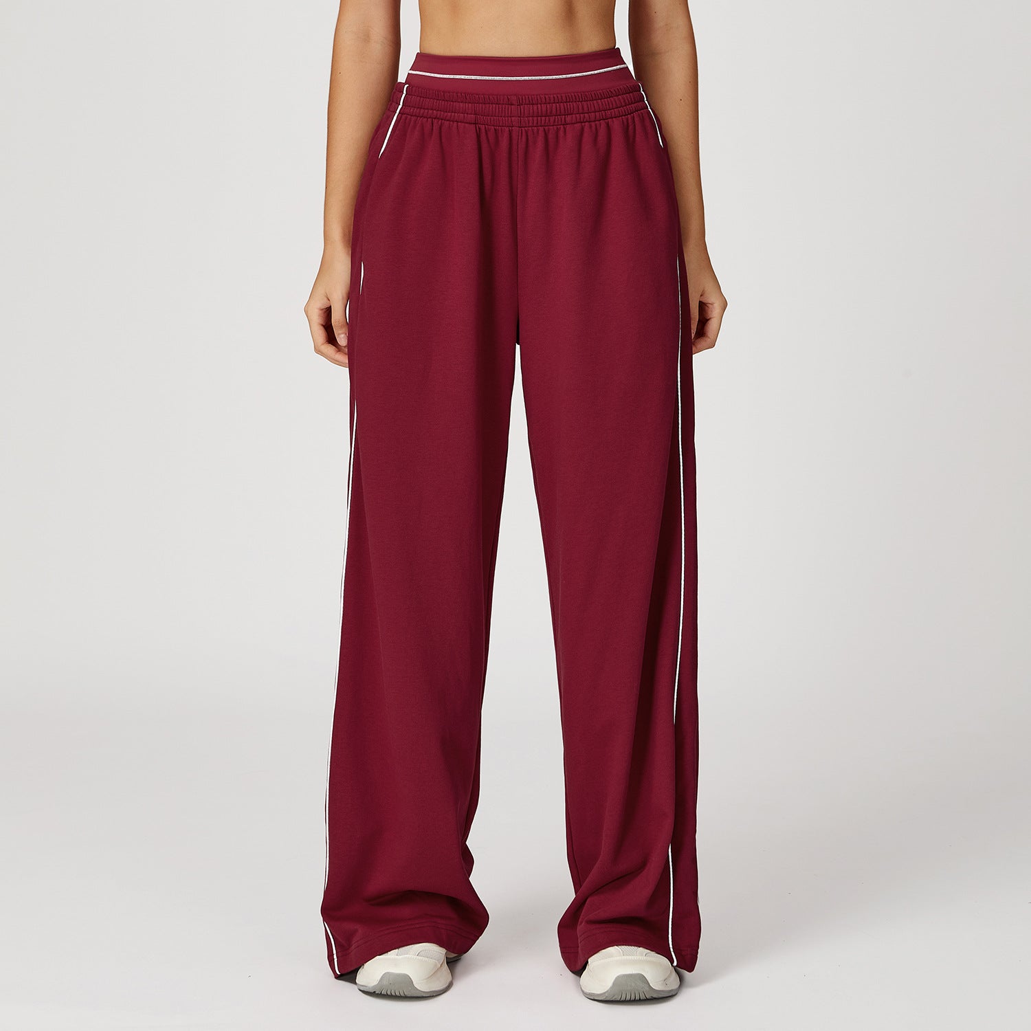 Daisy Harrison | Pantalon de survêtement noir à jambes larges avec bandes latérales