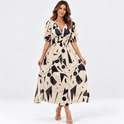 Camilla Rowntree | Robe midi fleurie à manches bouffantes