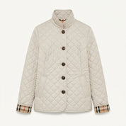 Eleanor Wyndham | Quilted Black Jacket With Stand Collar