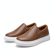 Serena Whitfield | Black Leather Slip-On Sneakers with White Sole