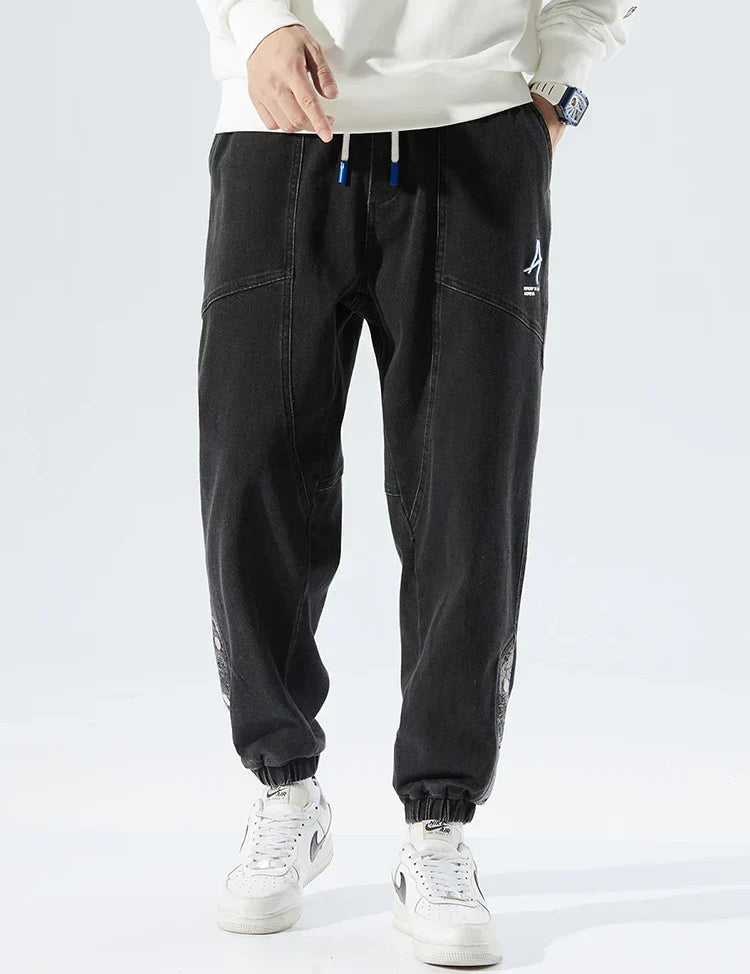 Callum Ashmore | Jean jogger délavé clair en denim pour homme