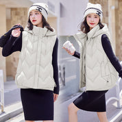 Isla Lawson | Hooded Quilted Gilet in Warm Coffee Brown