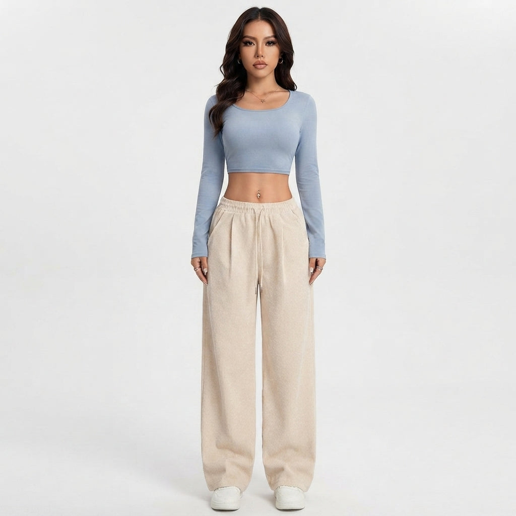 charlotte-baker-green-corduroy-wide-leg-trousers-model.jpg
