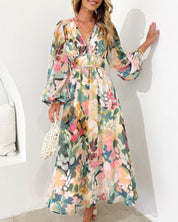 Olivia Turner | Robe midi à imprimé floral, décolleté en V et manches bouffantes