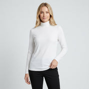 Isla Thompson | Fleece-Lined Turtleneck Long Sleeve Top - White