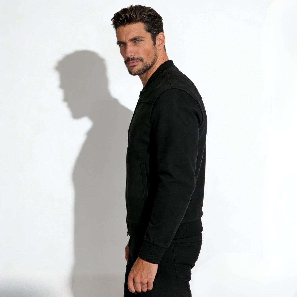 kouvr-mens-black-suede-bomber-jacket-side-profile_d2ea4ec2-a372-4e2f-ad89-0174130e5f80.jpg