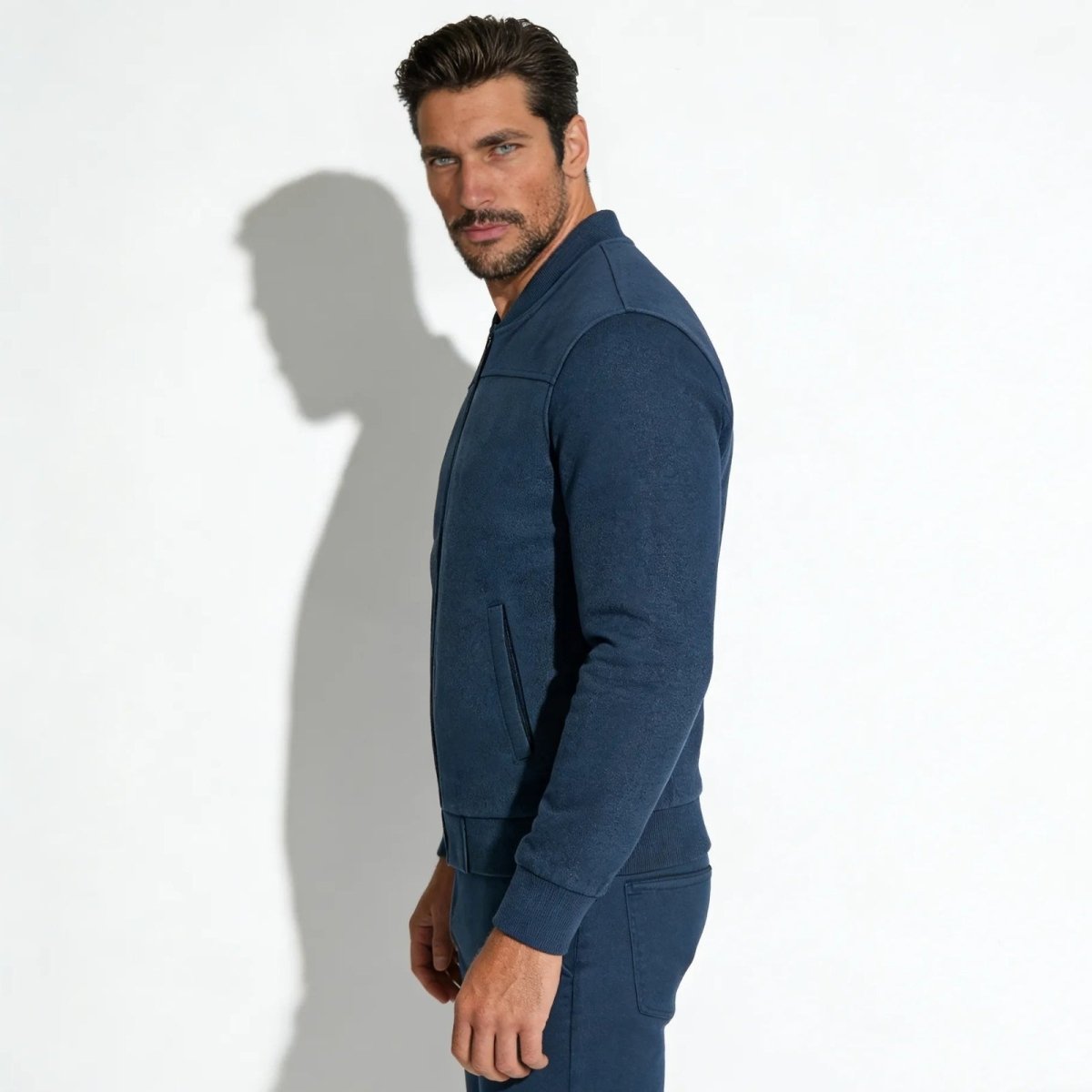 kouvr-michael-suede-bomber-jacket-slate-blue-side-profile_ada04716-4144-4aab-b21e-6ed2dc28a73f.jpg