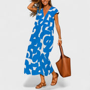 Sophia Whitmore | Robe longue à col en V et imprimé abstrait