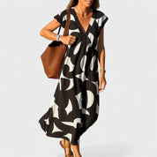Sophia Whitmore | Robe longue à col en V et imprimé abstrait
