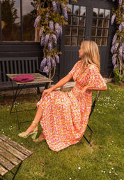 Daisy Campbell | Orange Floral Pleated Maxi Dress with Flutter Sleeves