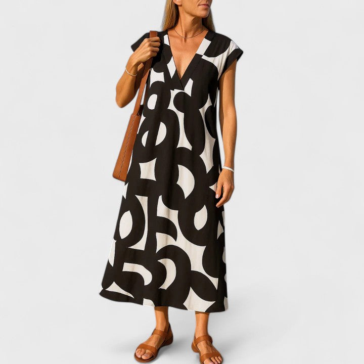 Sophia Whitmore | Robe longue à col en V et imprimé abstrait