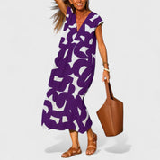 Sophia Whitmore | Robe longue à col en V et imprimé abstrait